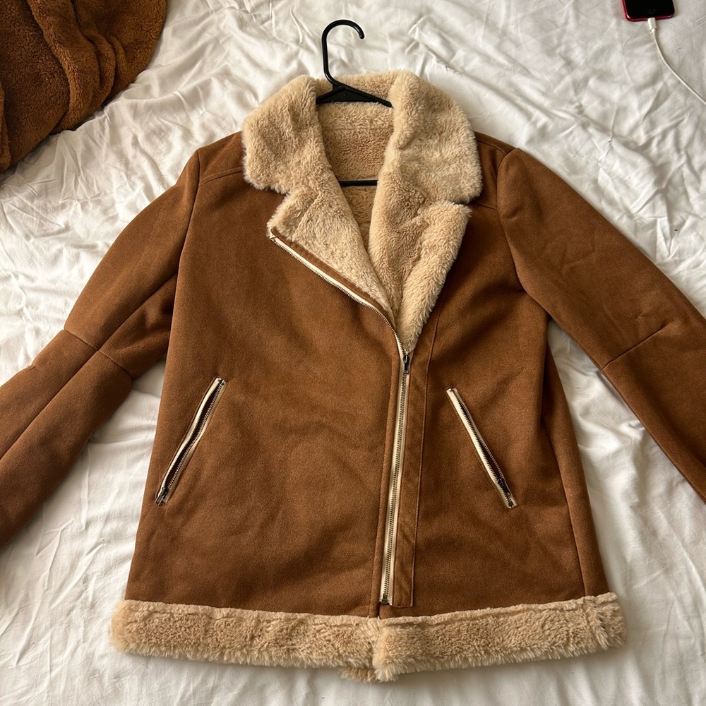 Faux Fur lined tan jacket.